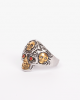 Skull-shaped gold and silver men's ring RM28